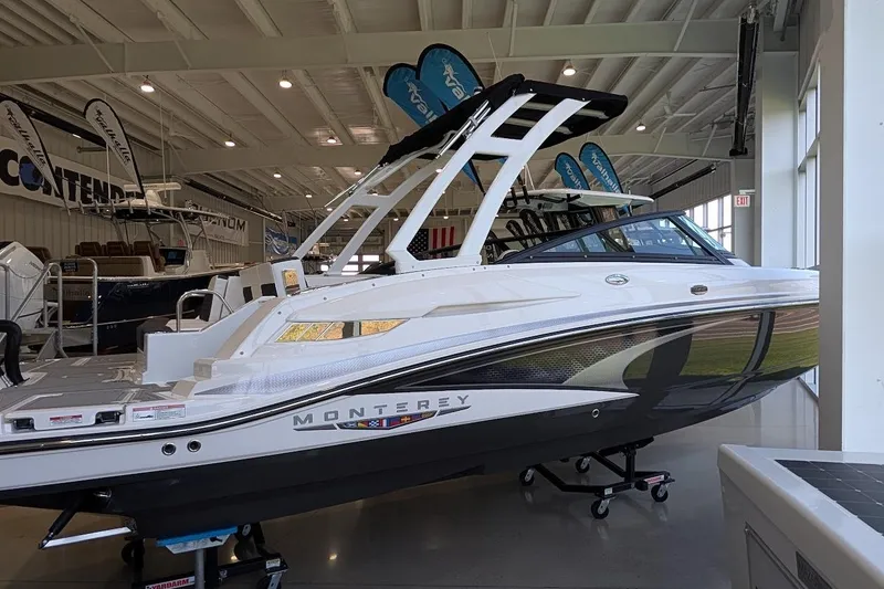The Image of 2026 Monterey M-45 boat displayed in a showroom, showcasing sleek design and modern features. - 0