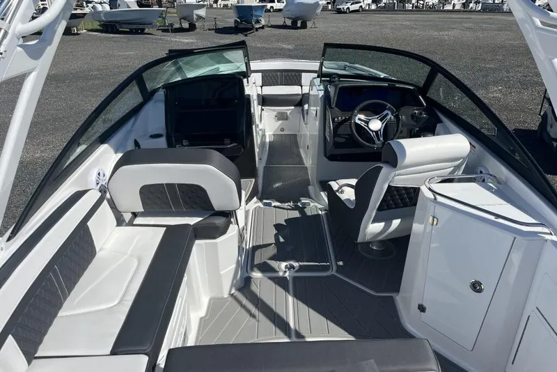 Slide: The Image of 2026 Monterey M-45 boat interior with sleek seating and modern steering console. - 4