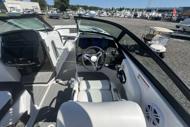 Slide: The Image of Interior view of 2026 Monterey M-45 boat, featuring sleek design and modern controls. - 5