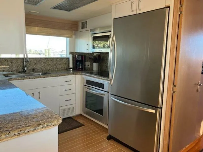 Slide: The Image of Modern kitchen in 1996 Hatteras 70 Sport Deck Motor Yacht with stainless steel appliances. - 20