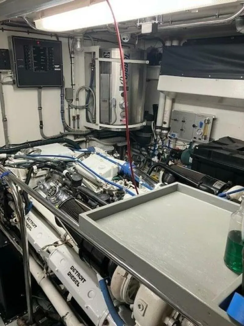 Slide: The Image of Engine room of 1996 Hatteras 70 Sport Deck Motor Yacht with Detroit Diesel engines. - 41