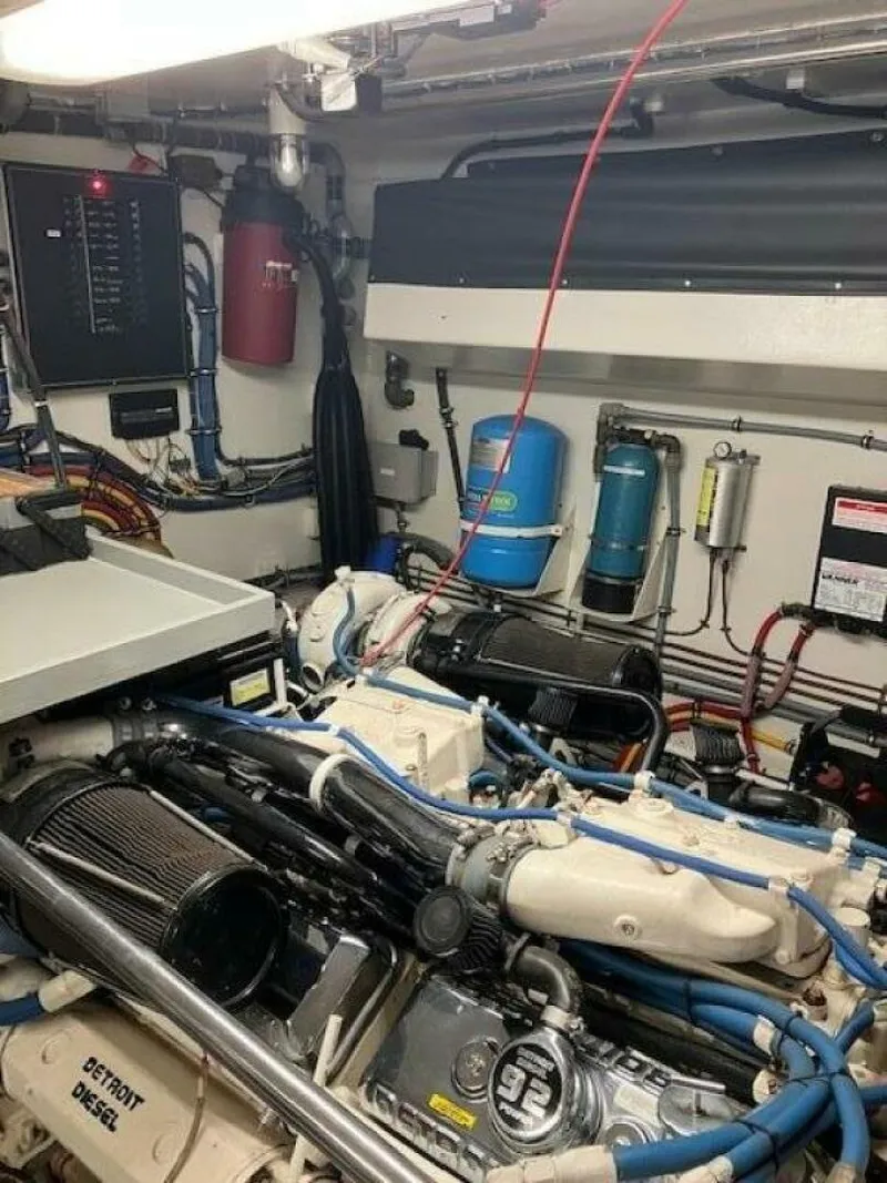 Slide: The Image of Engine room of 1996 Hatteras 70 Sport Deck Motor Yacht with Detroit Diesel engines. - 42