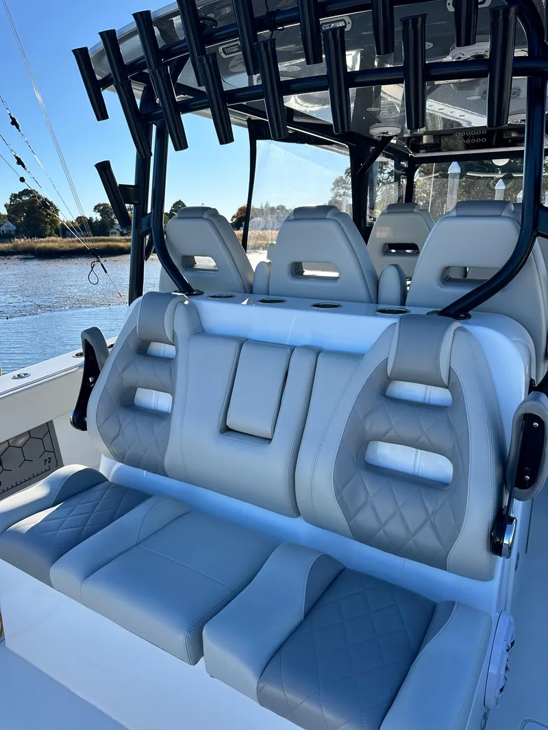 Slide: The Image of Luxurious seating on 2024 Wyatt and Freeman 42LR boat, featuring sleek design and comfort. - 10