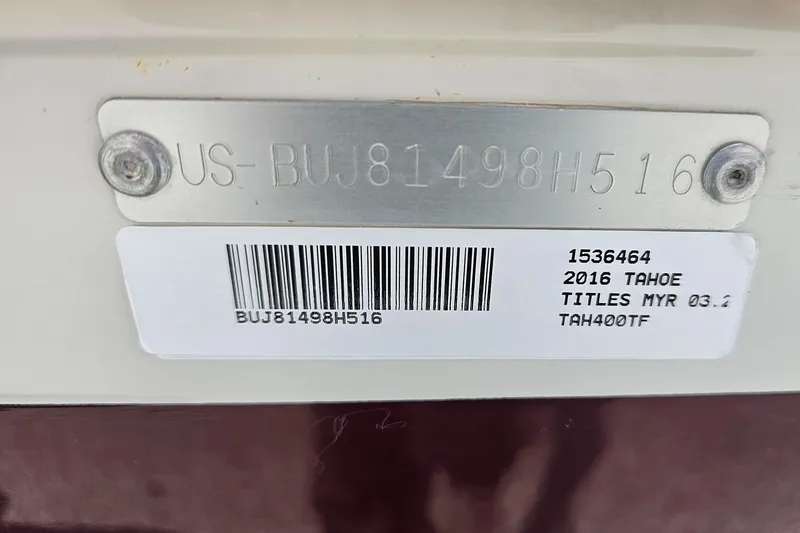 Slide: The Image of 2016 Tahoe 400TF identification plate with serial number and barcode. - 15