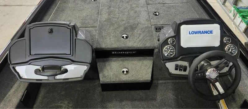 Slide: The Image of 2025 Ranger RT198P boat dashboard with Lowrance display and steering wheel. - 4