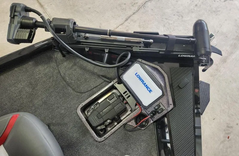 Slide: The Image of 2025 Ranger RT198P boat with Lowrance electronics and trolling motor setup. - 6