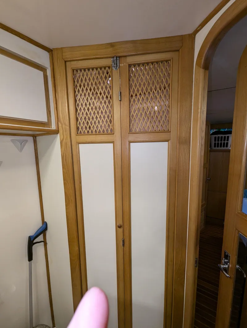 Slide: The Image of Wooden lattice door in a 1988 Custom Hi-tech 44 interior. - 24