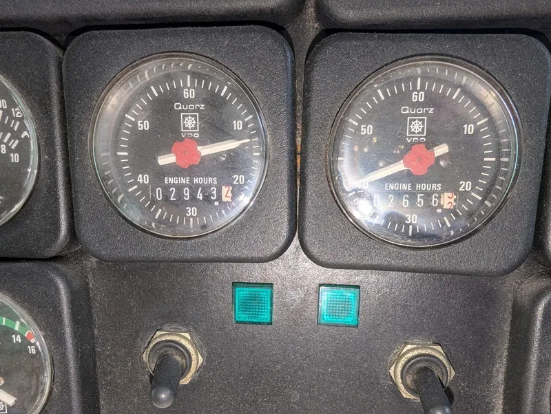 Slide: The Image of Dashboard with two engine hour meters, Custom Hi-tech 44, 1988 model. - 6