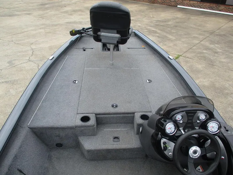 Slide: The Image of 2021 Tracker Pro Team™ 190 TX boat interior with steering console and seating. - 4