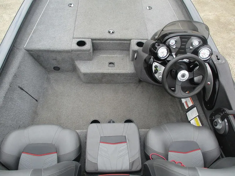 Slide: The Image of 2021 Tracker Pro Team™ 190 TX boat interior with steering console and seating. - 5