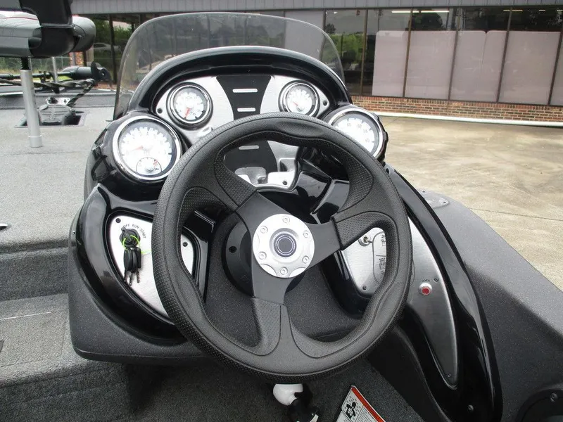Slide: The Image of Steering console of 2021 Tracker Pro Team™ 190 TX boat with gauges and controls. - 9