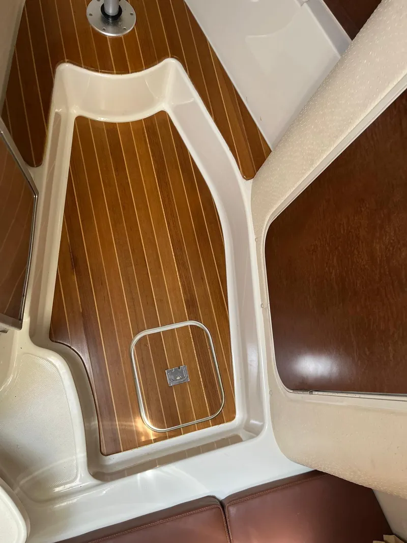 Slide: The Image of 2008 Hydra-Sports 3500VX cabin interior with wood flooring and seating. - 27