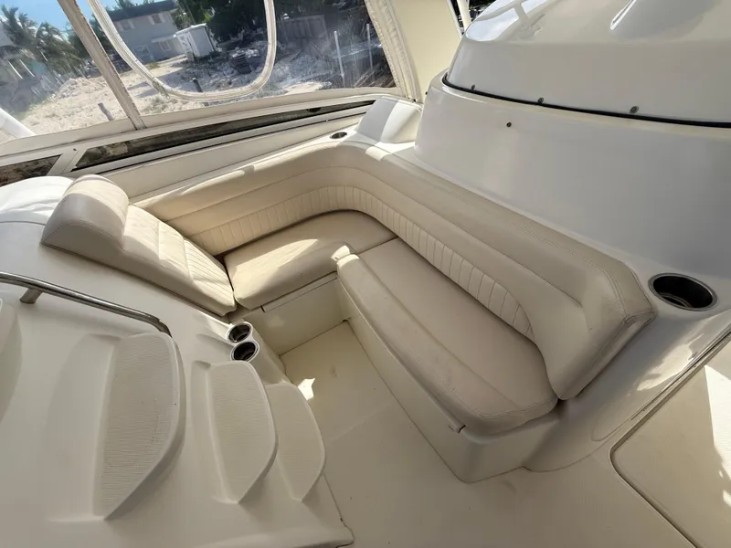 Slide: The Image of 2008 Hydra-Sports 3500VX boat interior with white seating and cup holders. - 28