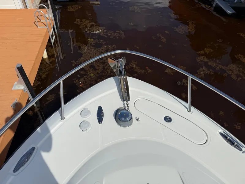 Slide: The Image of Bow of 2008 Hydra-Sports 3500VX boat docked near wooden pier. - 29