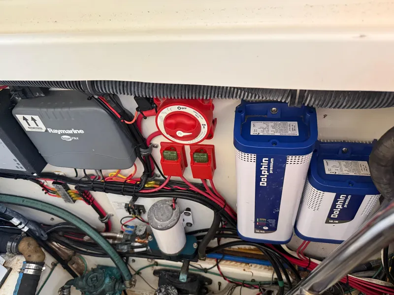 Slide: The Image of Electrical components in a 2008 Hydra-Sports 3500VX boat, featuring Raymarine and Dolphin systems. - 41
