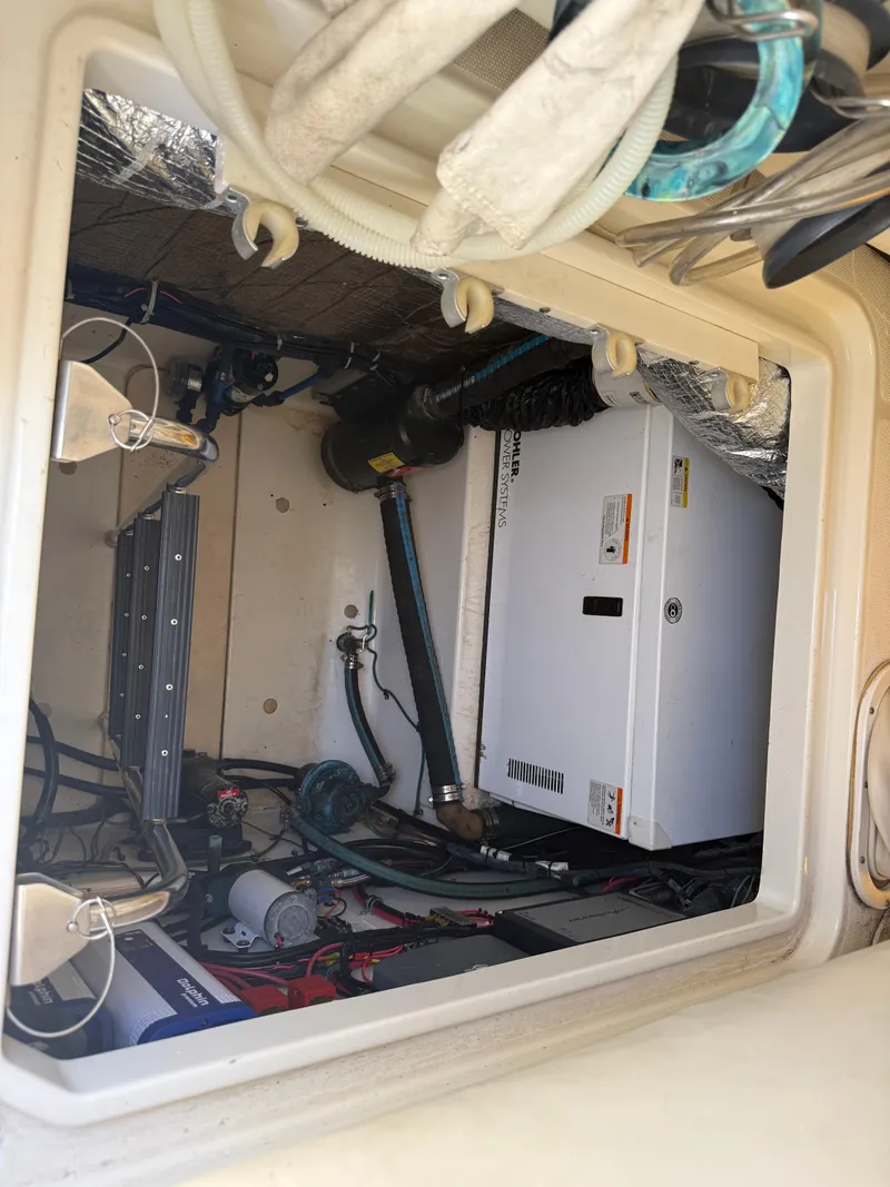 Slide: The Image of 2008 Hydra-Sports 3500VX engine compartment with electrical components and wiring. - 44