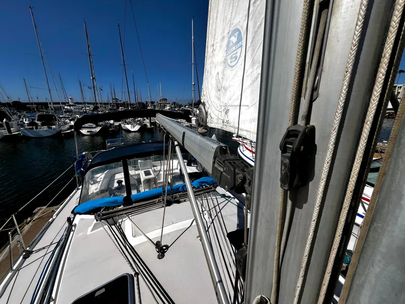 Slide: The Image of Sailboat Catalina 350, 2007 model, docked in marina with clear blue sky. - 17