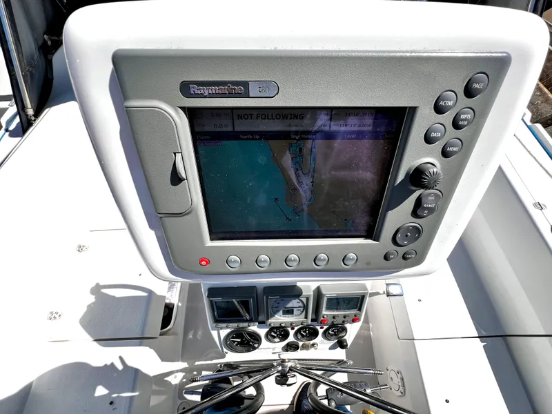 Slide: The Image of Raymarine navigation system on 2007 Catalina 350 sailboat, displaying nautical map and controls. - 26