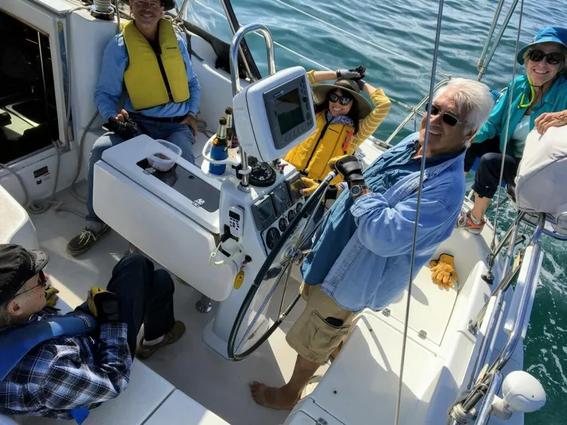 Slide: The Image of Group enjoying a sail on a 2007 Catalina 350 yacht. - 8