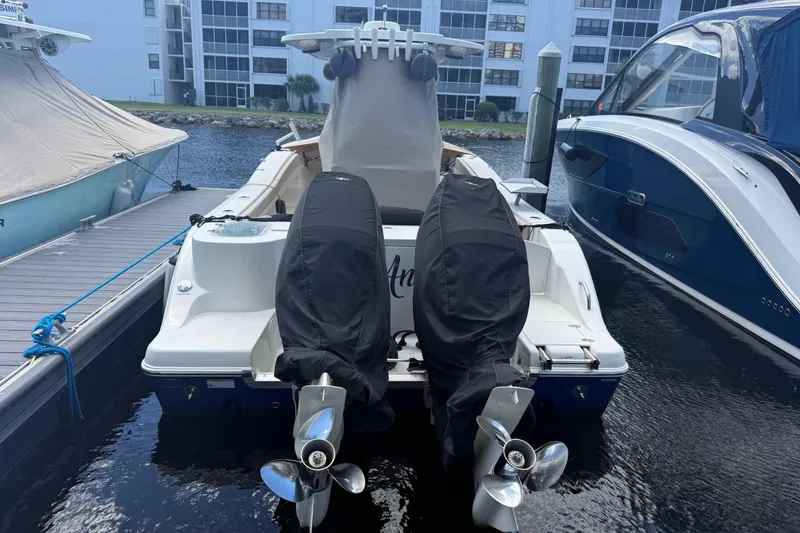 Slide: The Image of Batteries in a 2018 NauticStar 28 XS boat, connected with red cables. - 20