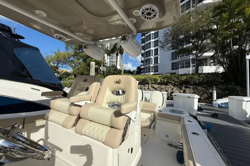 Slide: The Image of 2018 NauticStar 28 XS boat interior with luxury seating and modern amenities. - 26