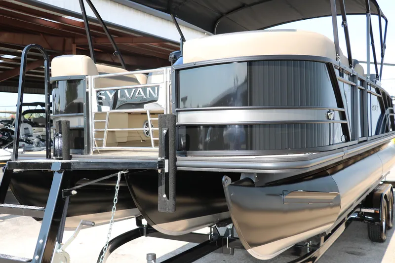 Slide: The Image of 2025 Sylvan L3 RLZ pontoon boat on trailer, rear view. - 10