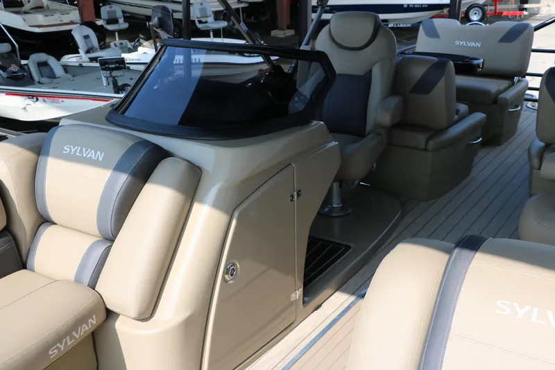 Slide: The Image of 2025 Sylvan L3 RLZ boat interior with luxurious seating and modern design. - 13