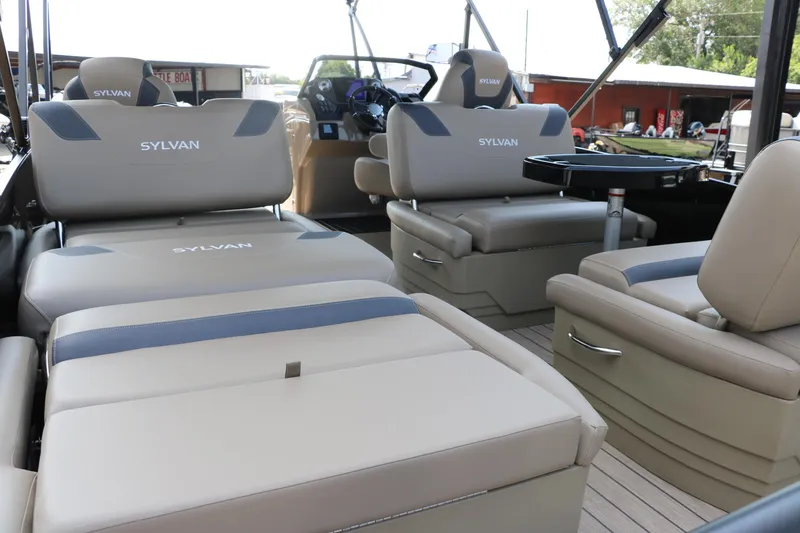 Slide: The Image of 2025 Sylvan L3 RLZ boat interior with luxurious seating and modern design. - 15