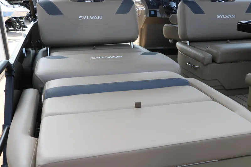 Slide: The Image of 2025 Sylvan L3 RLZ boat interior with luxurious seating and modern design. - 17
