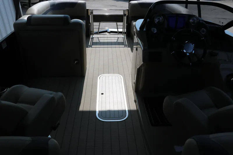Slide: The Image of Interior of 2025 Sylvan L3 RLZ boat with seating and steering console. - 20