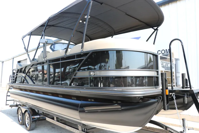 Slide: The Image of 2025 Sylvan L3 RLZ pontoon boat with canopy on trailer. - 7