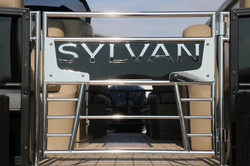 Slide: The Image of 2025 Sylvan L3 RLZ boat gate with chrome finish and beige interior. - 9