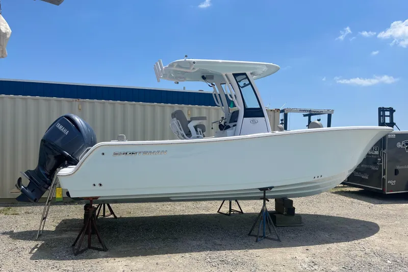 Slide: The Image of 2025 Sportsman Heritage 231 Center Console boat on display, featuring Yamaha outboard motor. - 0