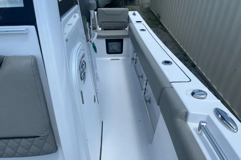 Slide: The Image of 2025 Sportsman Heritage 231 Center Console interior with seating and storage compartments. - 12