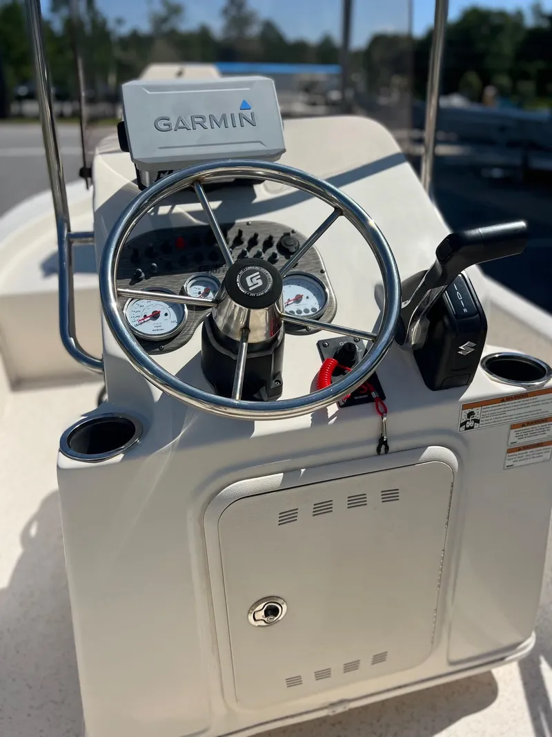 Slide: The Image of 2019 Carolina Skiff 18 JVX CC boat console with Garmin navigation system. - 3