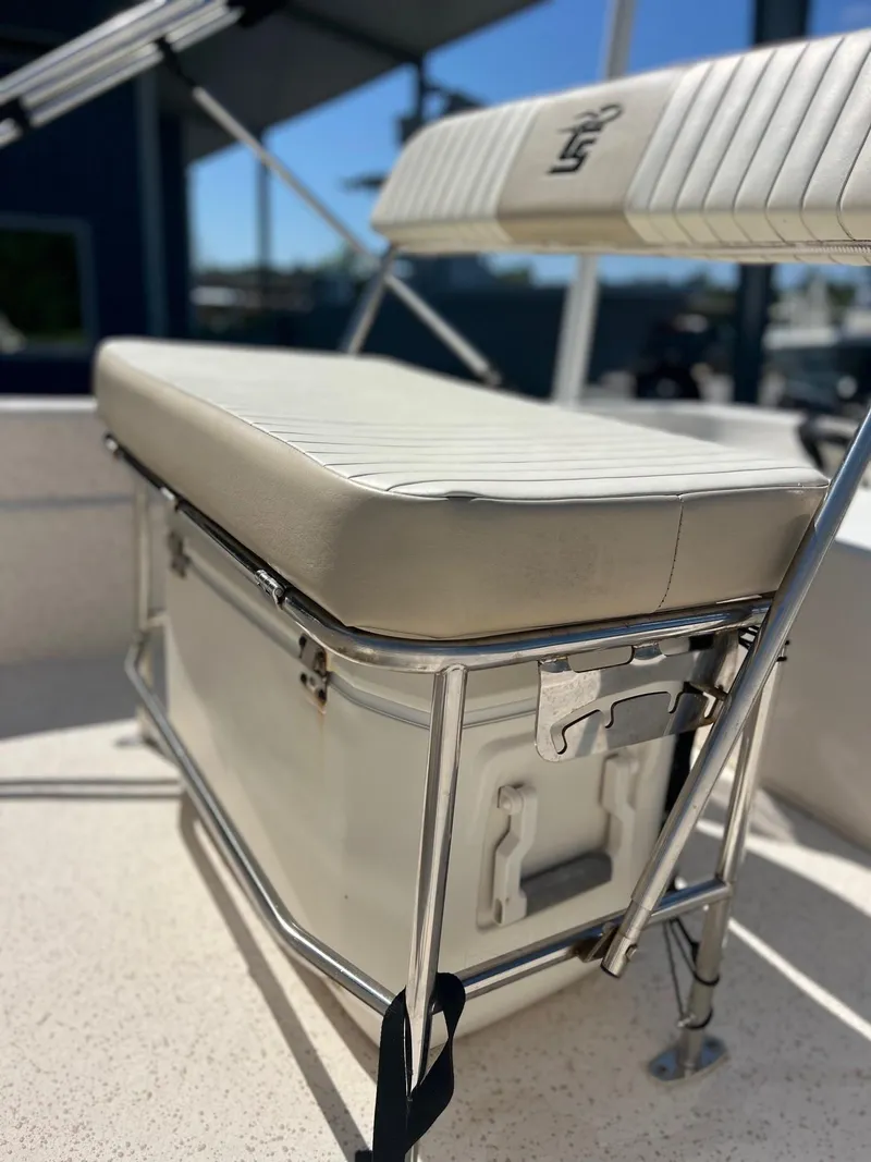 Slide: The Image of 2019 Carolina Skiff 18 JVX CC boat seat and cooler detail. - 5