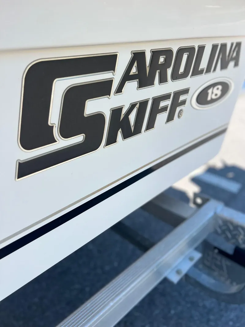 Slide: The Image of Close-up of 2019 Carolina Skiff 18 JVX CC logo on boat hull. - 8