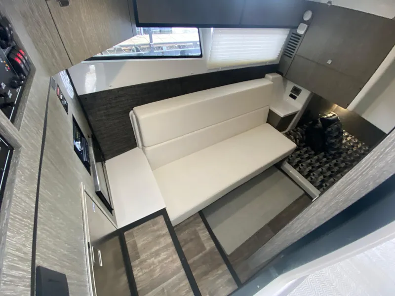 Slide: The Image of Interior of 2022 Monterey 378SS boat with modern seating and stylish design. - 45