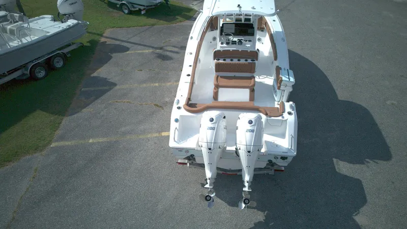 Slide: The Image of 2026 Sea Hunt Ultra 275 SE boat with dual engines, aerial view. - 3