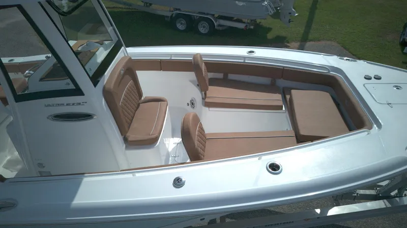 Slide: The Image of 2026 Sea Hunt Ultra 275 SE boat with spacious seating and sleek design. - 4