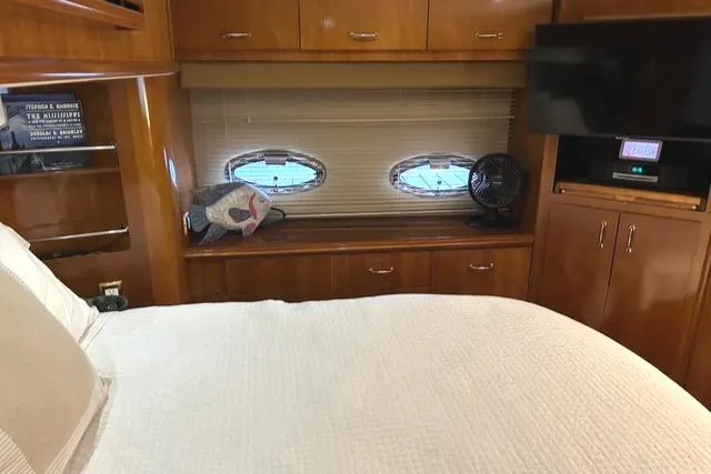 Slide: The Image of Luxurious interior of 2004 Carver 466 Motor Yacht with cozy bedroom and modern amenities. - 20