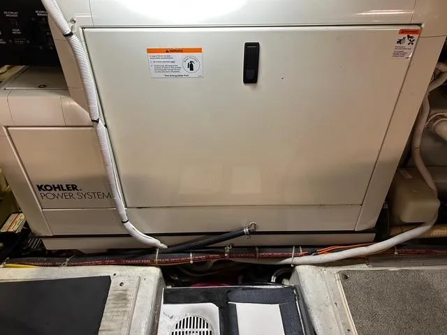 Slide: The Image of Volvo Penta TAMD75EDC engine in 2004 Carver 466 Motor Yacht, high performance label visible. - 31