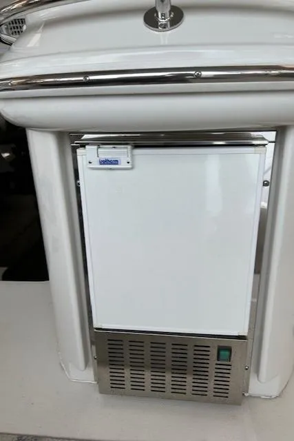 Slide: The Image of 2004 Carver 466 Motor Yacht interior with sleek black and white door design. - 8