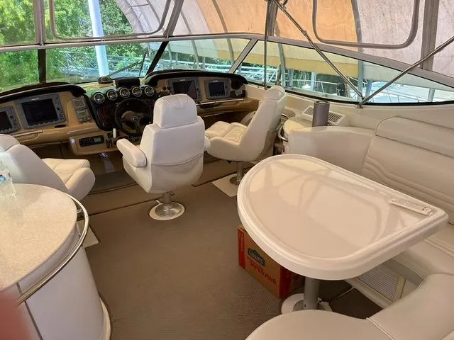 Slide: The Image of Built-in ice maker on 2004 Carver 466 Motor Yacht, featuring sleek white design. - 9