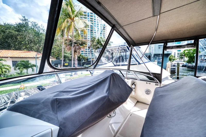 Slide: The Image of Interior of 2003 Silverton 43 Motor Yacht with seating and windows. - 18
