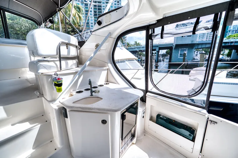 Slide: The Image of 2003 Silverton 43 Motor Yacht helm with navigation system. - 20
