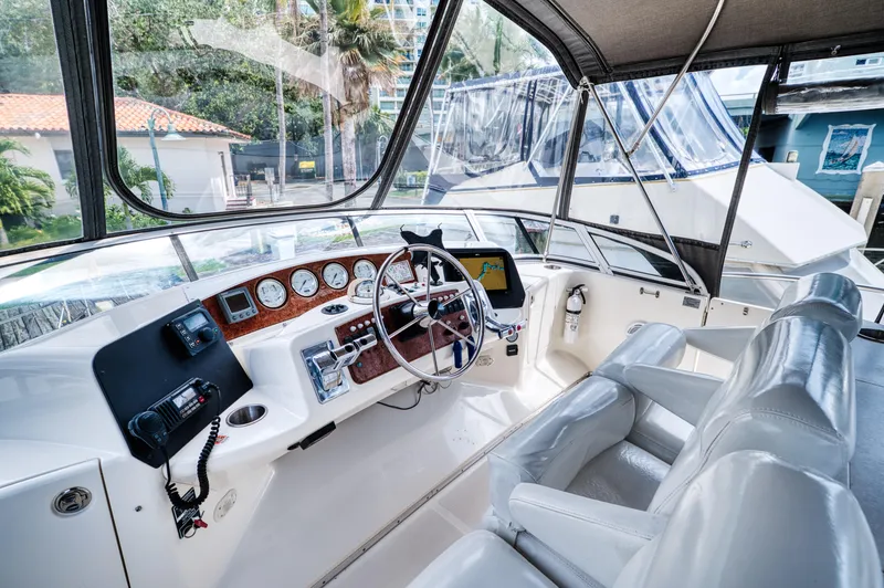 Slide: The Image of Interior of 2003 Silverton 43 Motor Yacht, helm with instruments. - 23