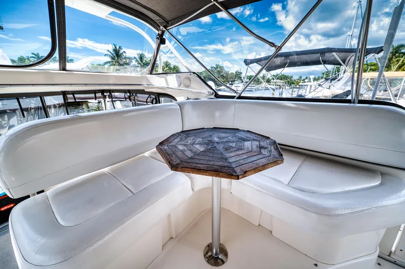 Slide: The Image of Interior of 2003 Silverton 43 Motor Yacht with seating area. - 27