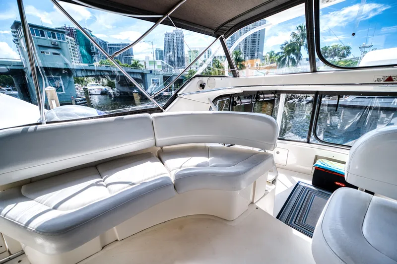 Slide: The Image of Interior of a 2003 Silverton 43 Motor Yacht with city view. - 28