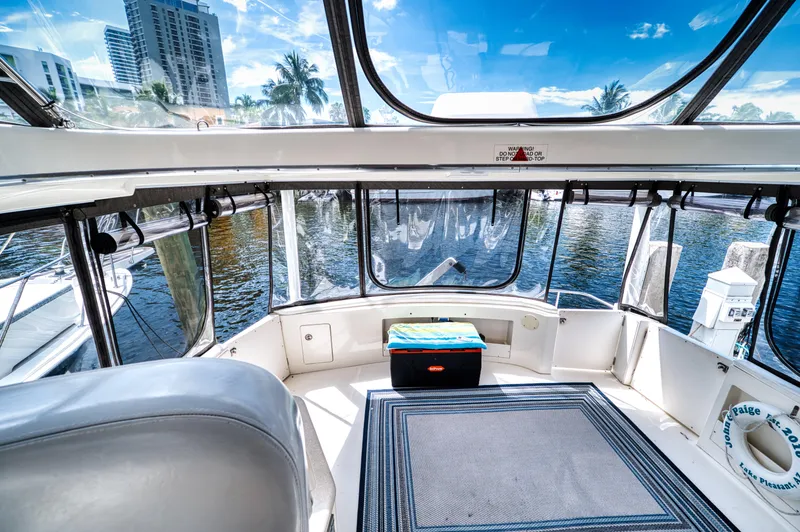 Slide: The Image of Interior of a 2003 Silverton 43 Motor Yacht overlooking the marina. - 29